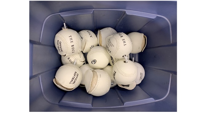 bin filled with partially completed beep baseballs